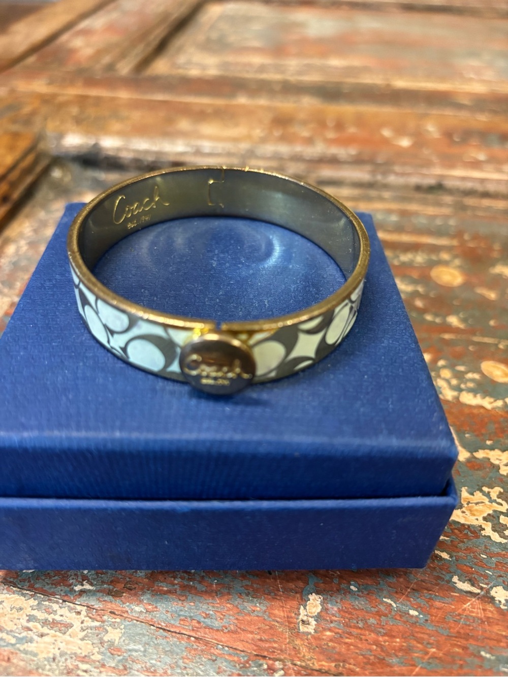 Coach Enamel Hinged Bangle Bracelet in White and Gold